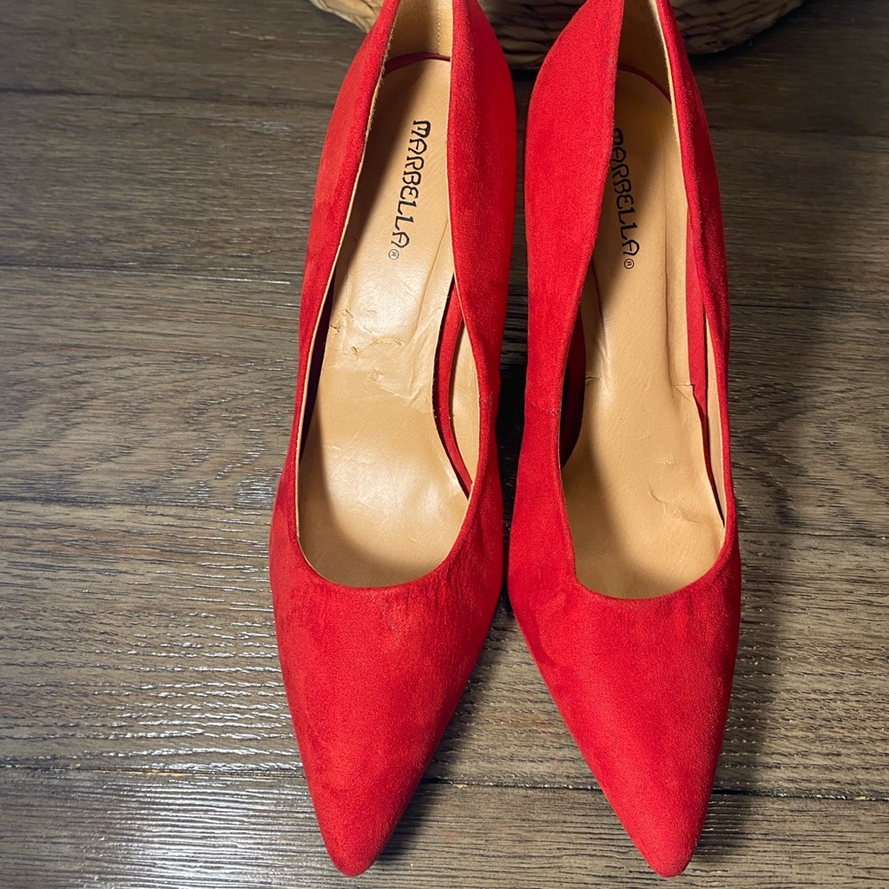 Marbella Red heels size 10M. Condition is used.